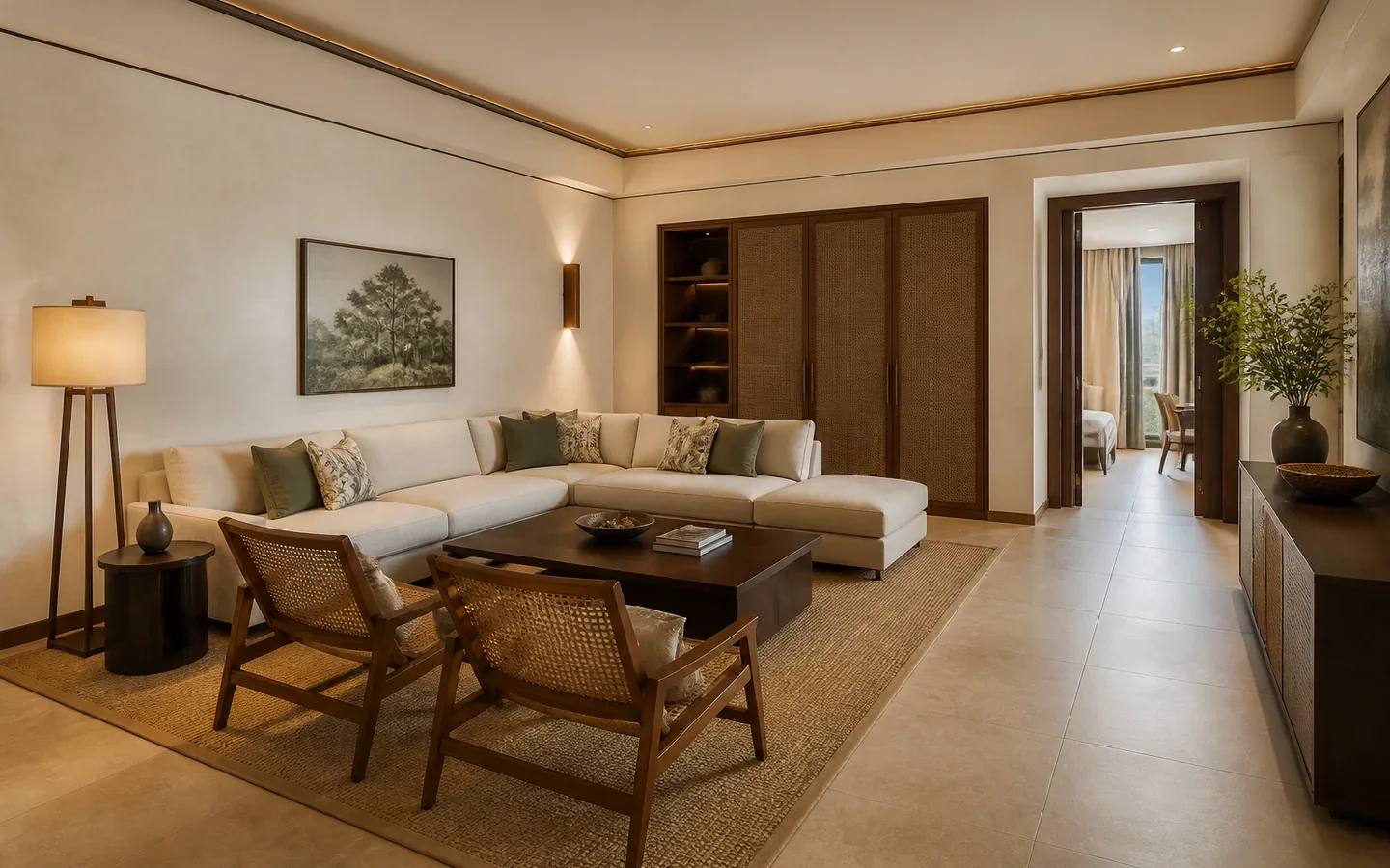 Fivestar Hotel Marina Family Suite living area with a cream sectional and cane chairs