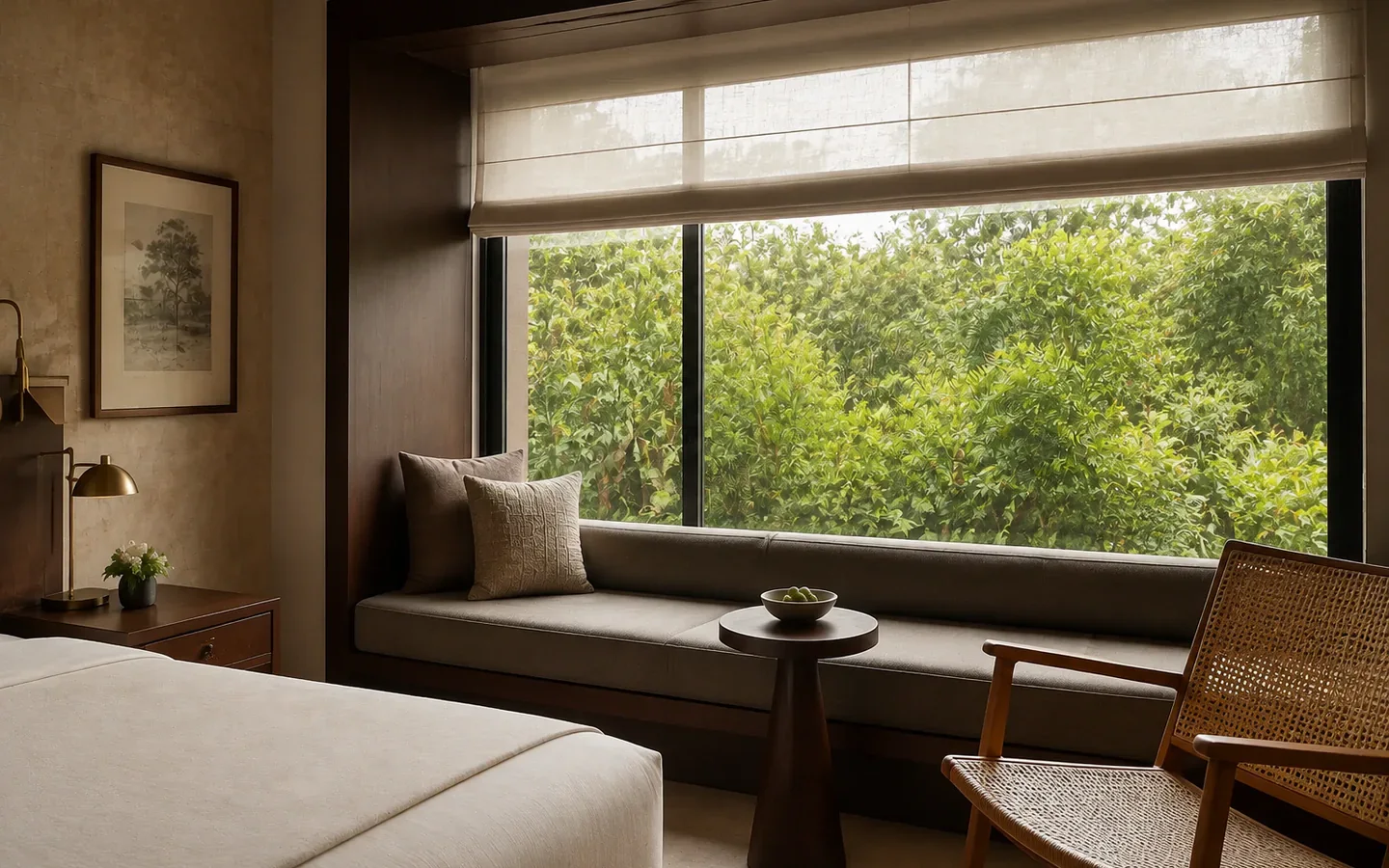 Fivestar Hotel Deluxe King Room window seat looking into tropical garden foliage